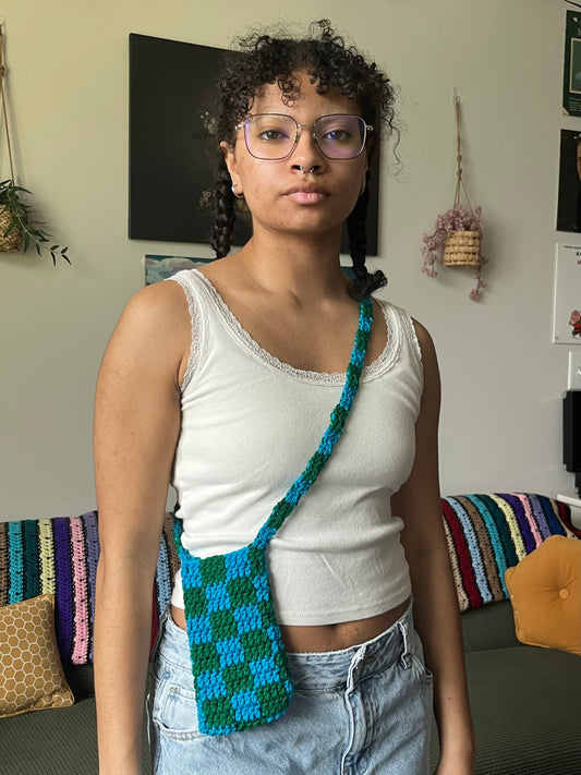 blue and green checkered phone bag