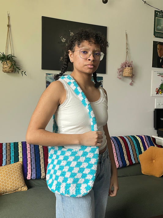 blue and white checkered bag