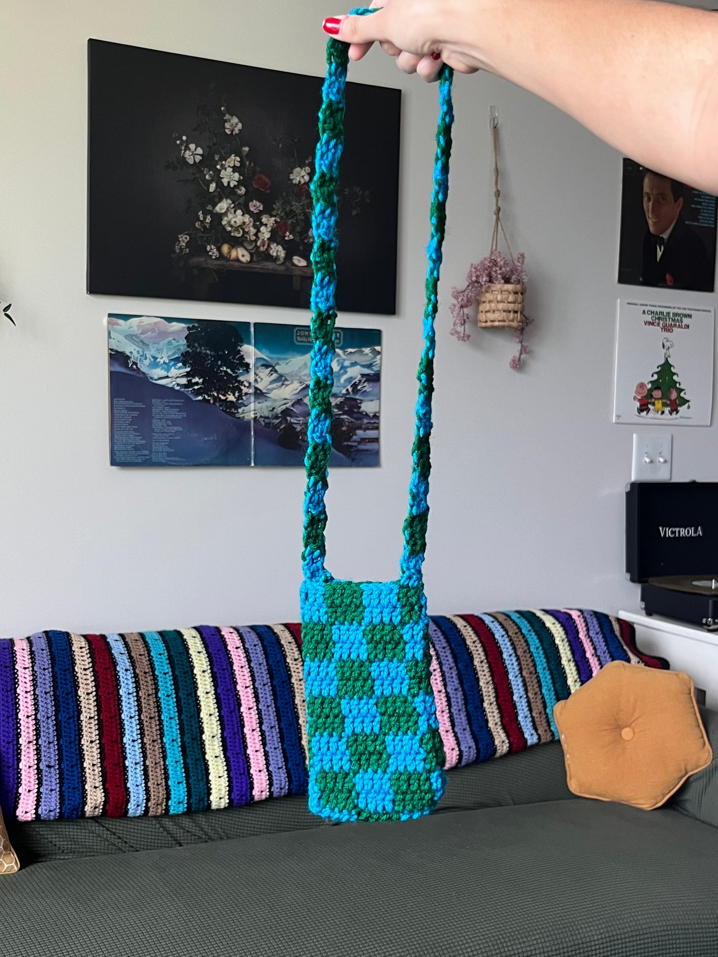 blue and green checkered phone bag