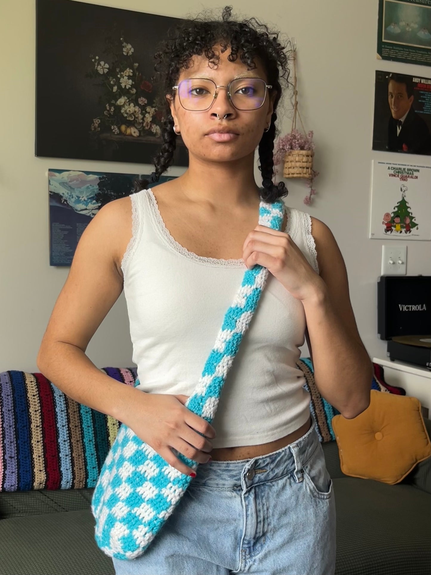 blue and white checkered bag